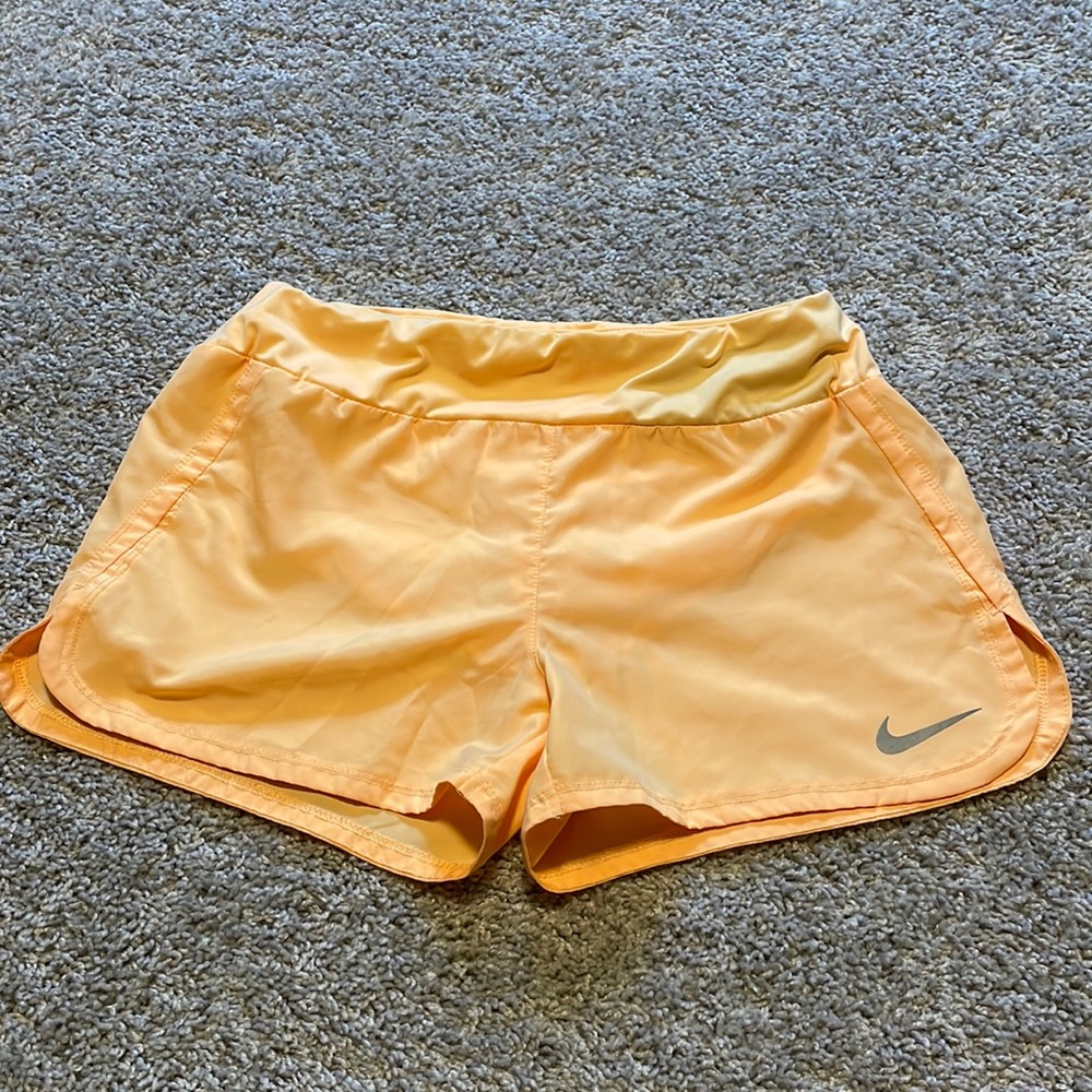 Nike orange running shorts